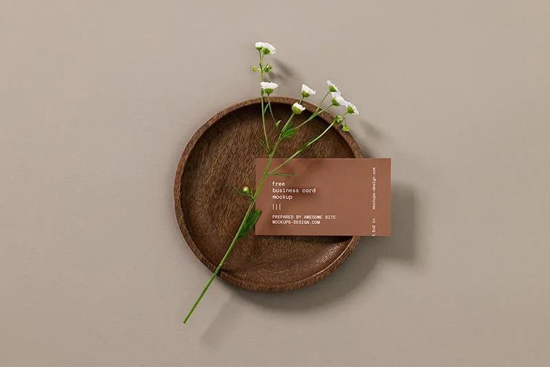 Business card with a flower mockup