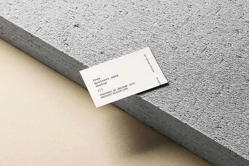 Free business card on a concrete block mockup
